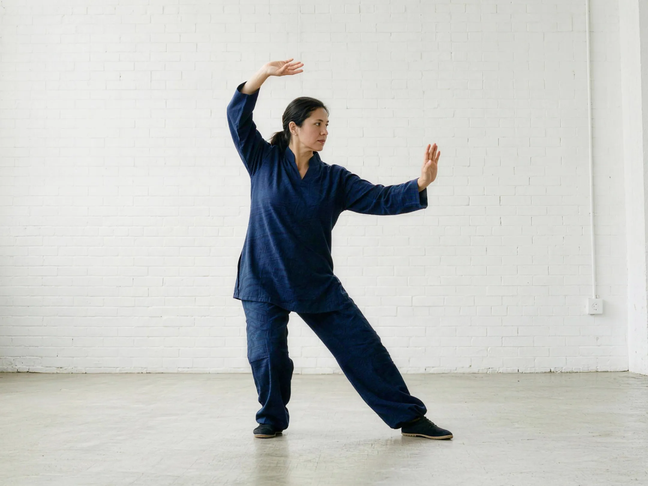 Seniors practicing Tai Chi in a coordinated formation